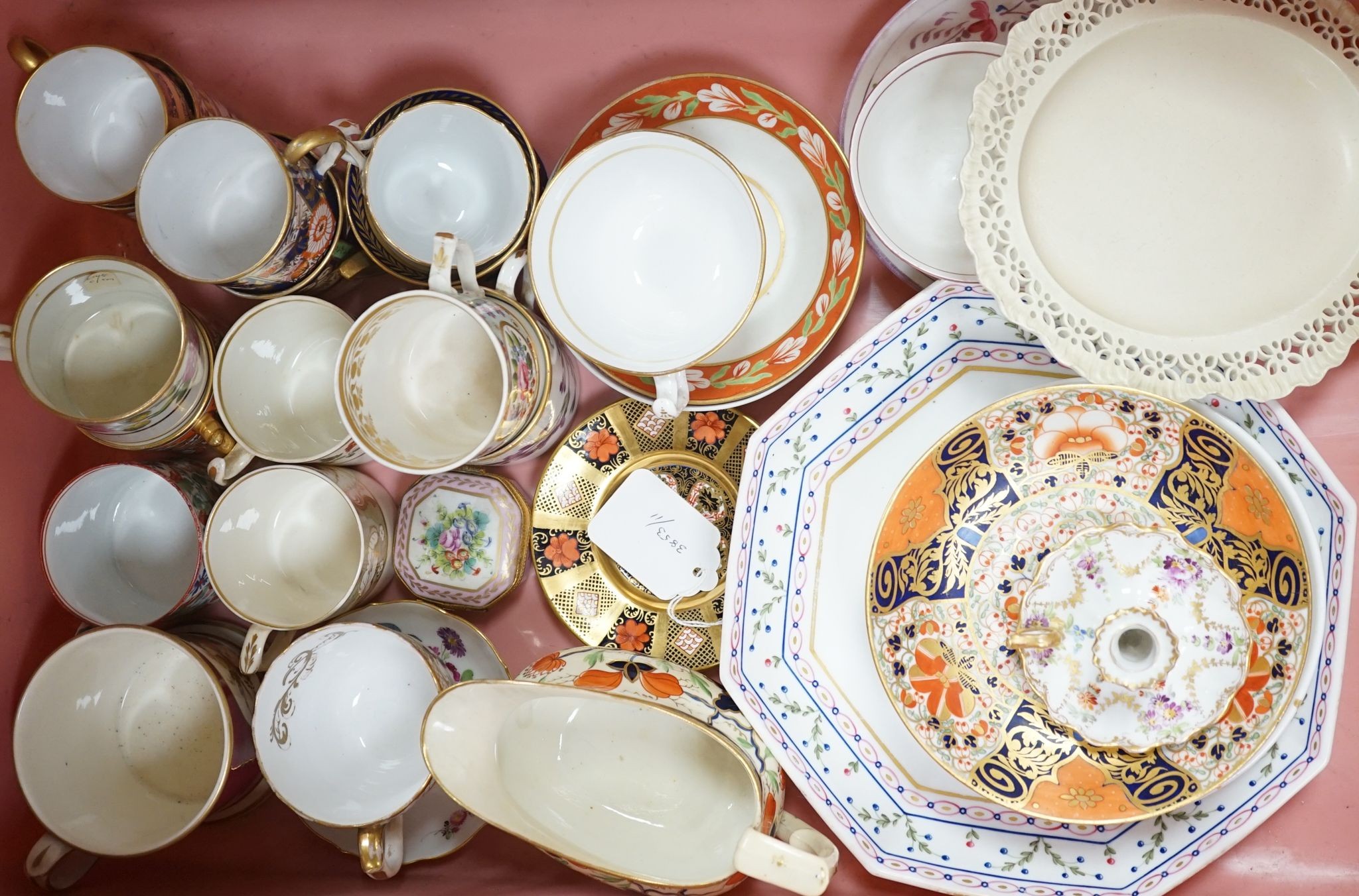 A collection of 19th century English porcelain tea and coffee cups, saucers and other tableware including Royal Crown Derby etc.